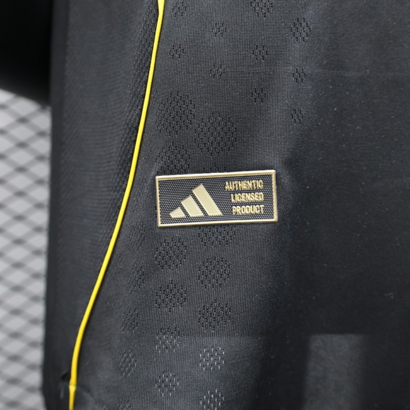 Player Version 25/26 Real Madrid Black with Gold Accents and Emirates Sponsor Jersey